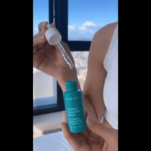 Woman adding Poetry Skincare's Intensely hydrating serum to her face and rubbing into her skin for hydration and moisturising.